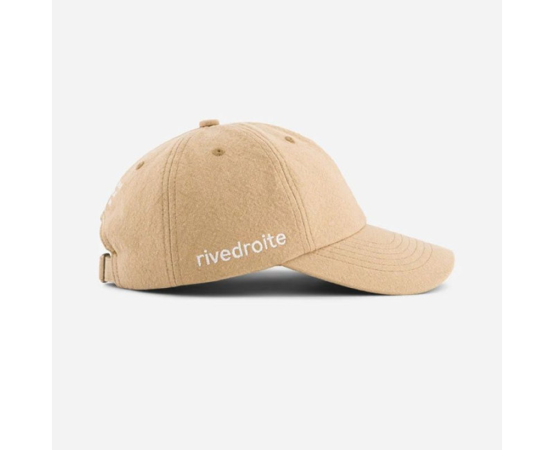 casquette beige avec inscription rive droite brodé blanc côté