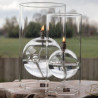 Lampe à huile en forme de boule entourée d'un cylindre en verre transparent